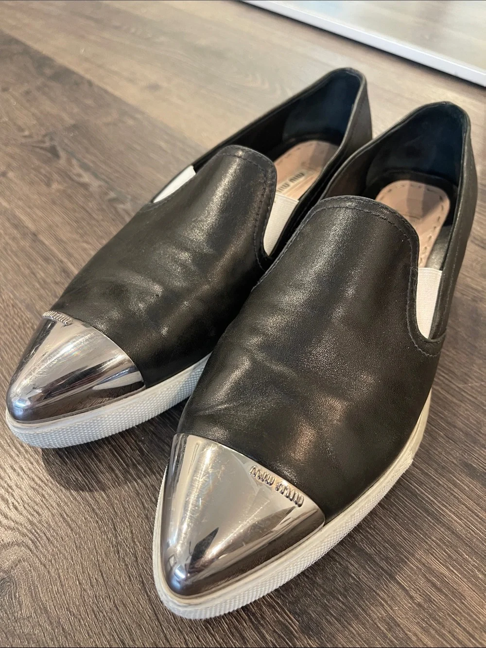 Miu Miu Black Leather Slip-Ons with Silver Cap Toe - Picture 3 of 9